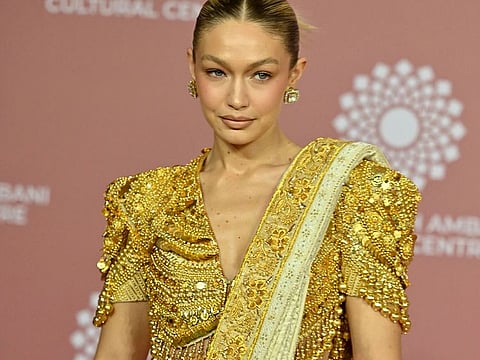  In this picture taken on April 1, 2023, US model Gigi Hadid poses for pictures during the inauguration of the Nita Mukesh Ambani Cultural Centre (NMACC) at the Jio World Centre (JWC) in Mumbai.  