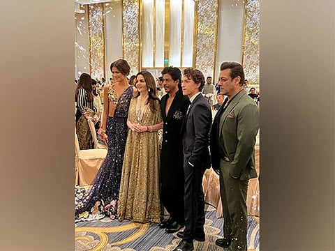 Shah Rukh and Salman posing with Tom Holland and Zendaya.