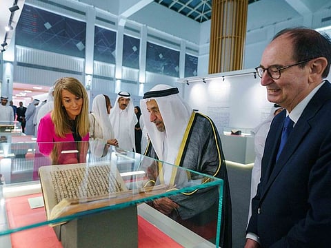 His Highness Dr Sheikh Sultan bin Mohammed Al Qasimi (centre), Supreme Council Member and Ruler of Sharjah, at the exhibition on Sunday night at the headquarters of Sharjah Book Authority