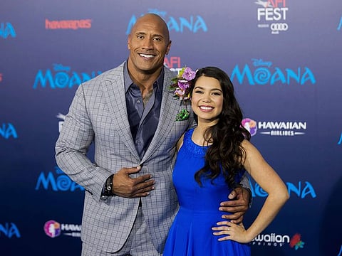 Actors Dwayne Johnson, left, and Auli'i Cravalho appear at the 2016 AFI Fest - "Moana" world premiere in Los Angeles on Nov. 14, 2016. 