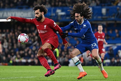Liverpool striker Mohamed Salah (left) vies with Chelsea's Spanish defender Marc Cucurella during their English Premier League match on Tuesday.