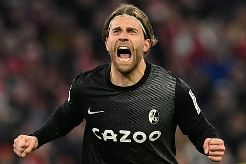 Freiburg's German forward Lucas Hoeler celebrates after scoring the winner against Bayern Munich during the German Cup quarter-final on Tuesday.