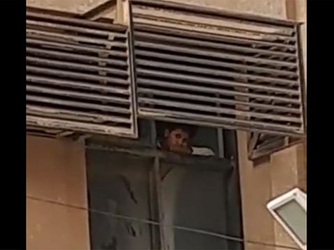 The detained student pees out of the classroom window,  