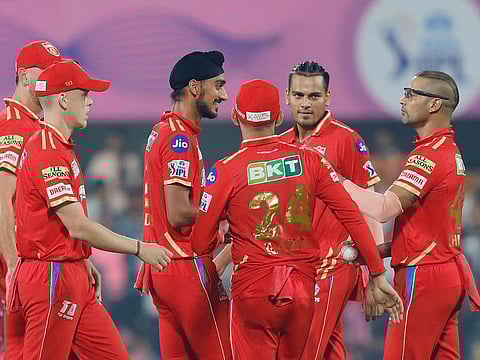 Punjab Kings' players celebrate a dismissal during their thrilling win over Rajasthan Royals on Wednesday.