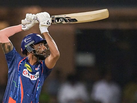 Lucknow Super Giants' Krunal Pandya watches the ball after playing a shot during the Indian Premier League match against Sunrisers Hyderabad at the Ekana Cricket Stadium in Lucknow.