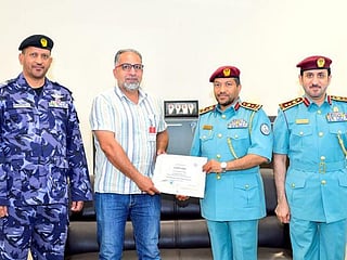 Sharjah Police honour a man for returning a wallet containing Dh150,000