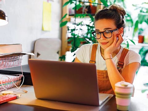 Woman looks into her computer