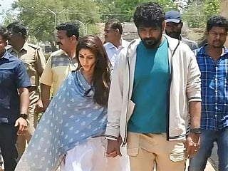 Indian actress Nayanthara threatens to break fan's phone during temple visit with Vignesh Shivan