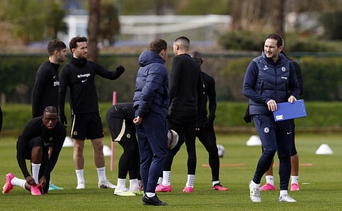 Chelsea manager Frank Lampard (right) takes a training session ahead of their match against Real Madrid tomorrow. 