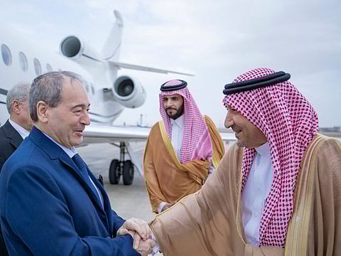 Saudi Arabia’s Deputy Foreign Minister Waleed Al Khuraiji receives Syrian Foreign Minister Faisal Mekdad at King Abdulaziz International Airport in Jeddah on Wednesday.. 