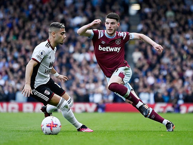 Fulham's Andreas Pereira in action with West Ham United's Declan