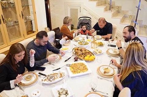 The Fakhira family enjoying Iftar together at their home in Dubai. 