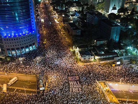 An aerial view shows people during a demonstration against Israeli Prime Minister Benjamin Netanyahu and his nationalist coalition government's judicial overhaul, in Tel Aviv, Israel, April 15, 2023.