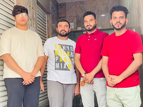 Grateful to be alive: Building residents Mohammed Ebnu Wafid, Mohammed Unais, Riyas Kaikambam and Jamsheer M.P.