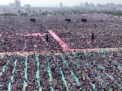  A large number of people attend the 'Maharashtra Bhushan Award' ceremony addressed by Union Home Minister Amit Shah (Unseen), in Navi Mumbai on Sunday. 