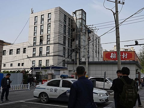 A damaged window is seen at the Changfeng Hospital in Beijing on April 19, 2023, after a fire broke out a day earlier