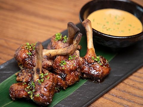 Chicken lollies with Japanese glaze and Korean Gochujang chili 
