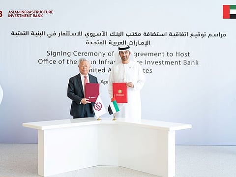 Dr. Sultan Al Jaber, Minister of Industry and Advanced Technology, COP28 President-Designate, and UAE Governor of the Asian Infrastructure Investment Bank; and Jin Liqun, President of the Asian Infrastructure Investment Bank.