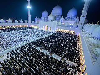 Worshippers pray at the Sheikh Zayed Grand Mosque in Abu Dhabi late on April 17, 2023 during Laylat Al Qadr, one of the holiest nights during the Muslim holy fasting month of Ramadan. -