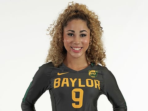 Payton Washington poses in an undated photo wearing Baylor University attire. Washington was one of two cheerleaders shot and wounded by a man in a Texas supermarket parking lot after one of them said she mistakenly got into his car thinking it was her own.  