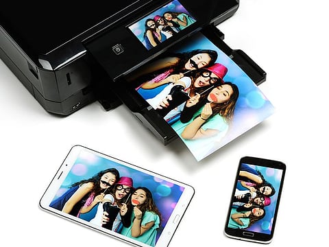 Get photo prints instantly at home and put some of the best vacation moments up on display.