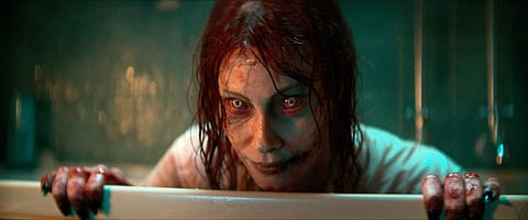 Alyssa Sutherland in a scene from 'Evil Dead Rise'.