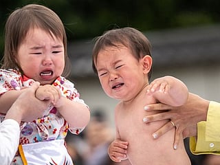 Pictures: Japan's 'crying baby sumo' festival returns after pandemic