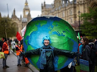 Look: Thousands rally outside UK parliament in biodiversity protest