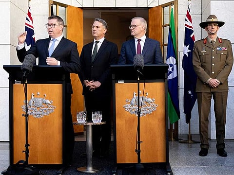 A handout photo taken and received from the Australian Department of Defence on April 24, 2023 shows Australia's Prime Minister Anthony Albanese (2nd R), Minister for Defence Richard Marles (2nd L) and Minister for Defence Industry Pat Conroy (L), along with the Chief of the Defence Force, General Angus Campbell (R), attending a press conference at Parliament House in Canberra. 