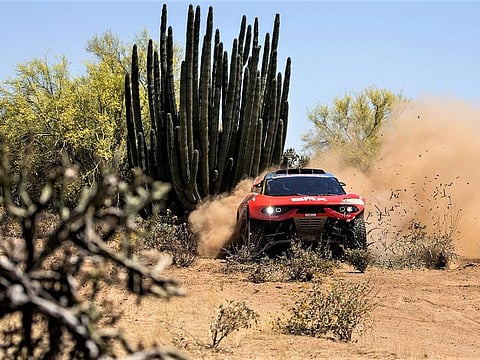 Sebastien Loeb and Fabian Lurquin in their Bahrain Raid Xtreme Prodrive Hunter in action during the prologue.