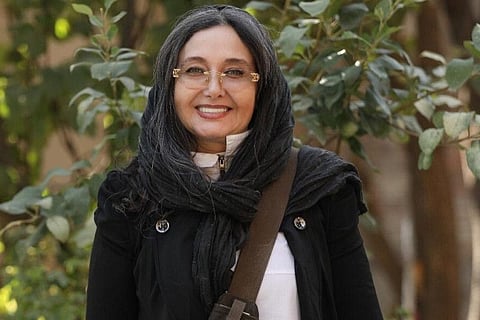 Riahi, 61, posted several photos taken in public places around Tehran in which she did not wear a headscarf.