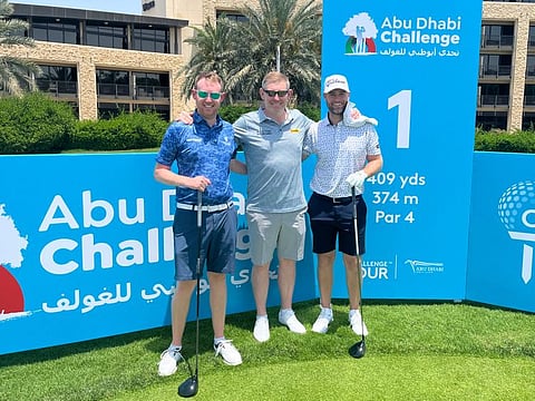 GULF NEWS Daily Diary host Stephen Gallacher (centre) playing a practice round with Dubai based Louis Gaughan and Lucas Bjerrgaard (Den)