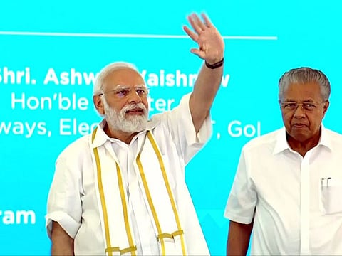 Prime Minister Narendra Modi gestures to supporters while laying the foundation stone for the Digital Science Park in Thiruvananthapuram on Tuesday, April 25, 2023.