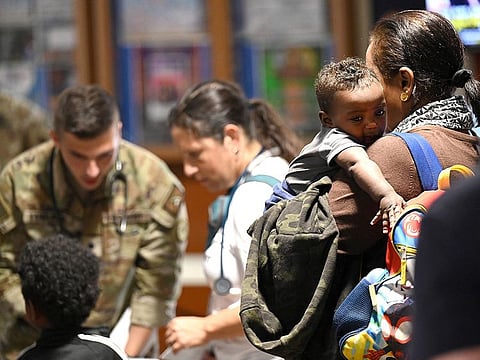 Evacuees from the US Embassy in Sudan arrive at Camp Lemonnier, Djibouti, on April 23, 2023.   