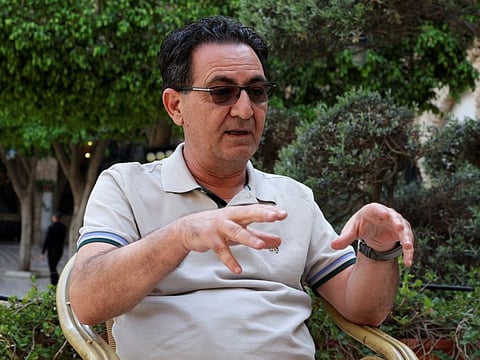 Ahmad Shams speaks to Reuters at the Lebanese restaurant and hotel Assaha, following his repatriation back to Beirut, on April 26, 2023. 