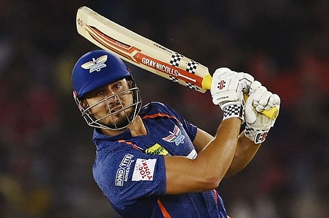 Lucknow Super Giants' Marcus Stoinis plays a shot during the IPL match against Punjab Kings in Mohali on Friday.
