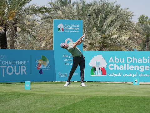 Joshua Grenville-Wood teeing off on the 9th hole at Abu Dhabi Golf Club