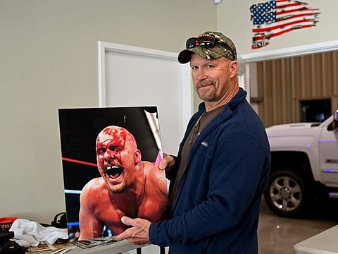 Six-time WWE champion, 'Stone Cold' Steve Austin, poses for a portrait to promote his new reality series "Stone Cold Takes On America".