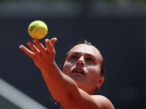 Belarus' Aryna Sabalenka serves to Russia's Mirra Andreeva in Madrid Open on Monday.