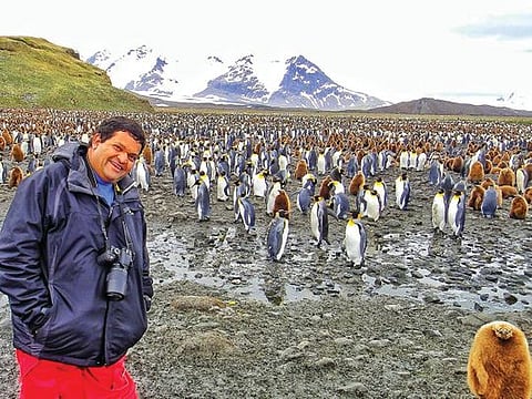 Ranjit Roy with the King Penguins of South Georgia
