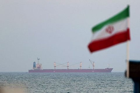 A picture taken on April 29, 2023, shows a shipping vessel sailing past Iran's Gulf island of Qeshm.  Last week, Iran seized an oil tanker carrying crude for Chevron amid wider tensions between Tehran and the US over its nuclear programme. The Advantage Sweet had 23 Indians and one Russian on board.