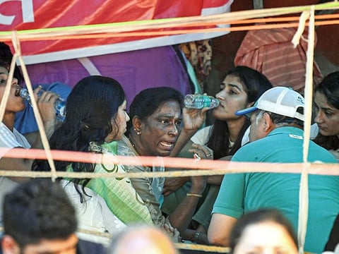 Indian Olympic Association President and Rajya Sabha MP P.T. Usha meets with wrestlers Vinesh Phogat, Sakshi Malik and others amid their ongoing protest against WFI chief Brij Bhushan Sharan Singh, at Jantar Mantar in New Delhi on Wednesday, May 3, 2023.