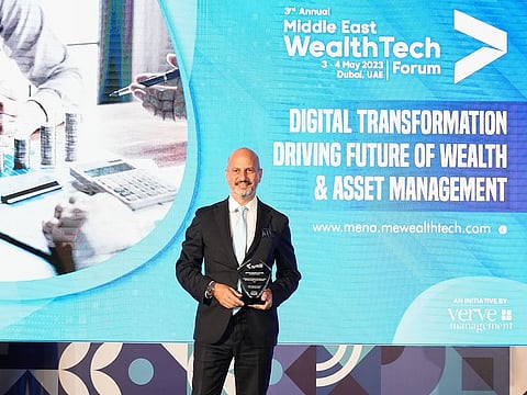 Fadi Dabbagh, AIX Investment Group’s President of the Board, receiving the award on behalf of the firm