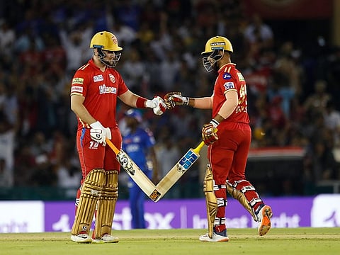 Mohali, May 03 (ANI): Punjab Kings' Liam Livingstone and Jitesh Sharma in a match against Mumbai Indians during the Indian Premier League 2023, at Punjab Cricket Association IS Bindra Stadium, in Mohali on Wednesday. (ANI Photo/Digital Restriction)