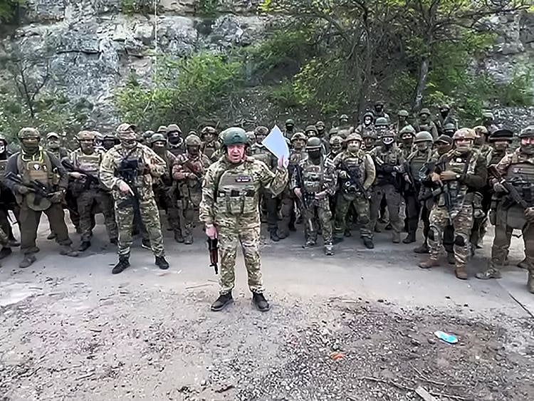 This video grab taken from a handout footage posted on May 5, 2023 on the Telegram account of the press-service of Concord — a company linked to the chief of Russian mercenary group Wagner, Yevgeny Prigozhin — shows Yevgeny Prigozhin addressing the Russian army’s top brass standing in front of Wagner fighters at an undisclosed location.