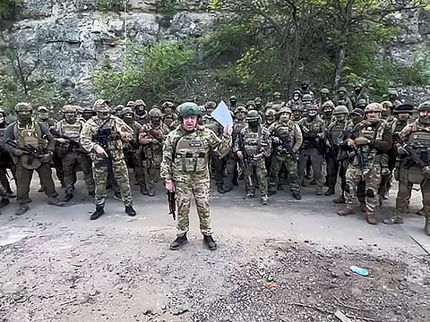This video grab taken from a handout footage posted on May 5, 2023 on the Telegram account of the press-service of Concord — a company linked to the chief of Russian mercenary group Wagner, Yevgeny Prigozhin — shows Yevgeny Prigozhin addressing the Russian army’s top brass standing in front of Wagner fighters at an undisclosed location. 
