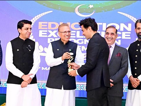 Pakistan’s singer-cum-social worker Shehzad Roy receives Education Excellence Award from President Dr Arif Alvi at President House.