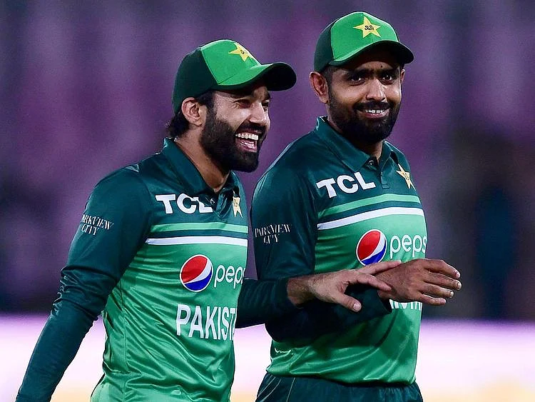 Pakistan's captain Babar Azam (R) and his teammate Mohammad Rizwan 