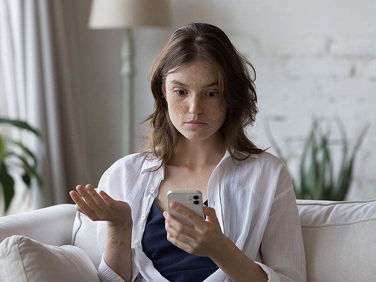 Person looking at her phone