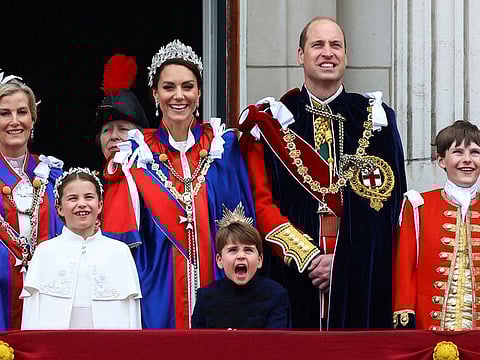 Britain's Sophie, Duchess of Edinburgh, Anne, Princess Royal, Britain's Prince William, Catherine, Princess of Wales, and their children Princess Charlotte and Prince Louis stand on the Buckingham Palace balcony following Britain's King Charles' coronation ceremony in London.
